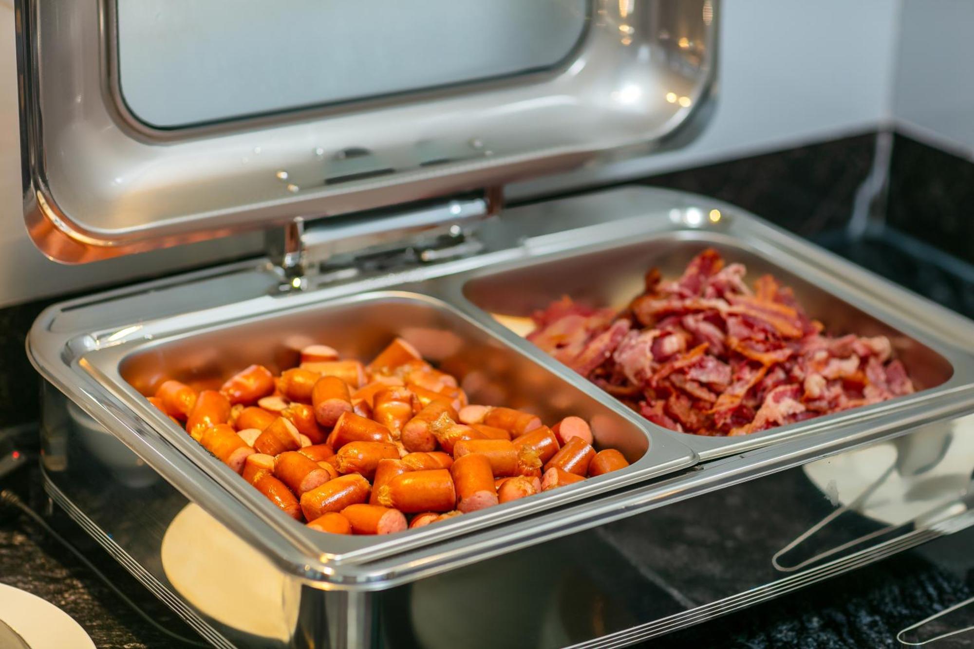 May De Ville Lakeside Hotel Ханой Екстер'єр фото A chafing dish